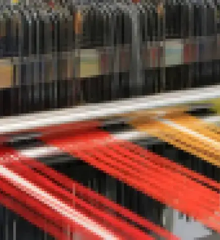 Spinning machine in a textile factory