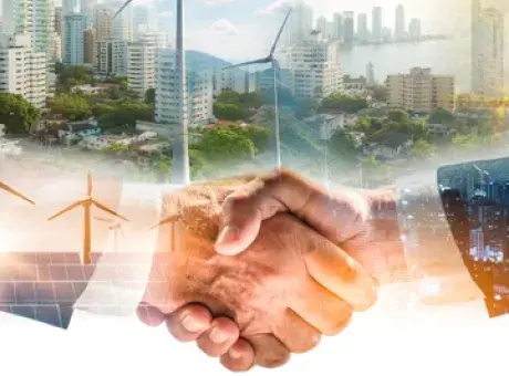 empresarios estrechan la mano