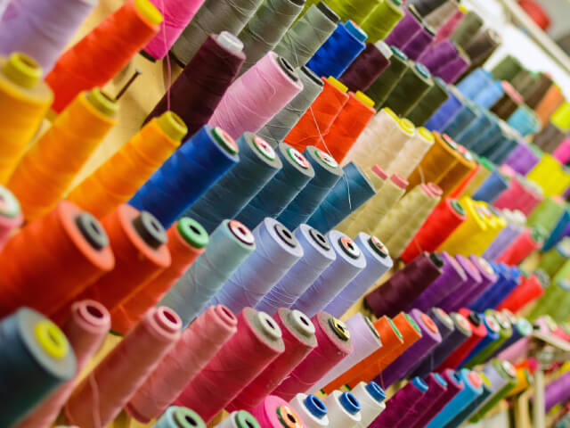 Colorful yarn plates used in the textile and weaving industry