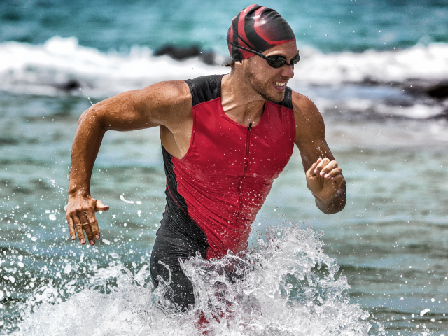 man with swimwear accessories to swimming in a river.